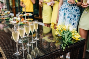 champagne glasses on the background of bright girls